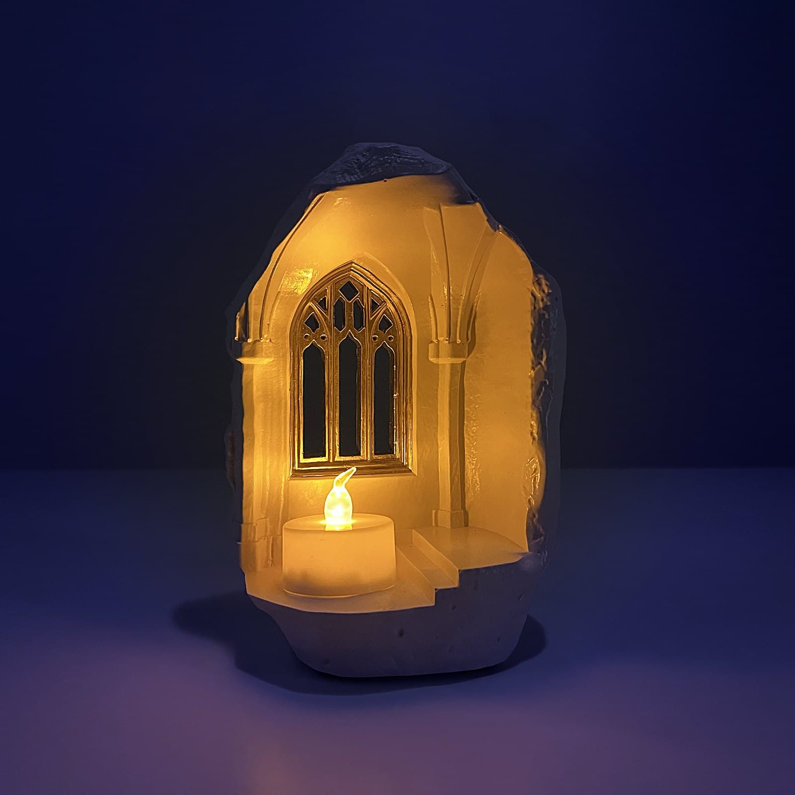Castle candle holder glowing in the dark with LED tealight